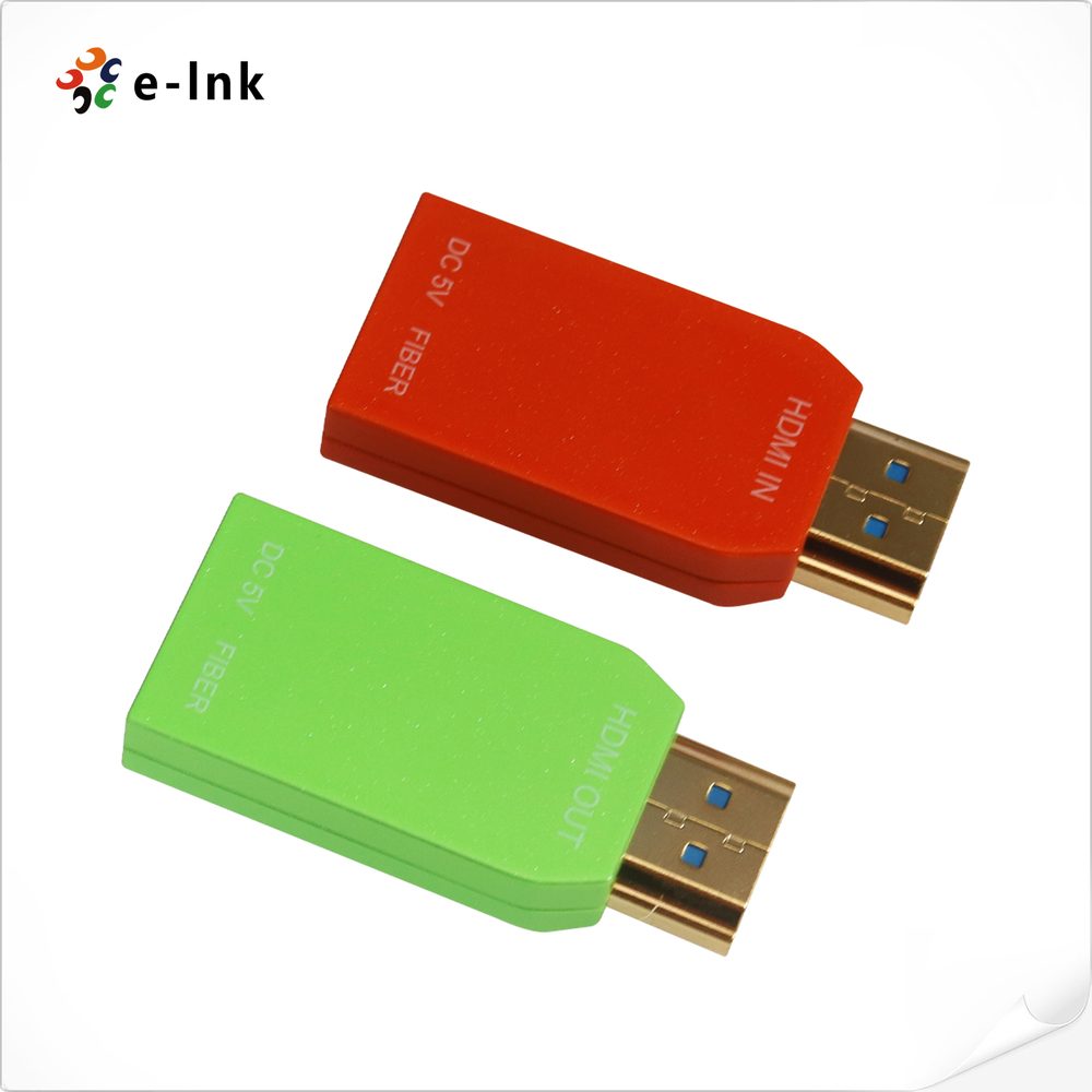 Red and green Micro Mini 4K HDMI fiber extender dongles, transmitter and receiver, with HDMI plugs and fiber ports